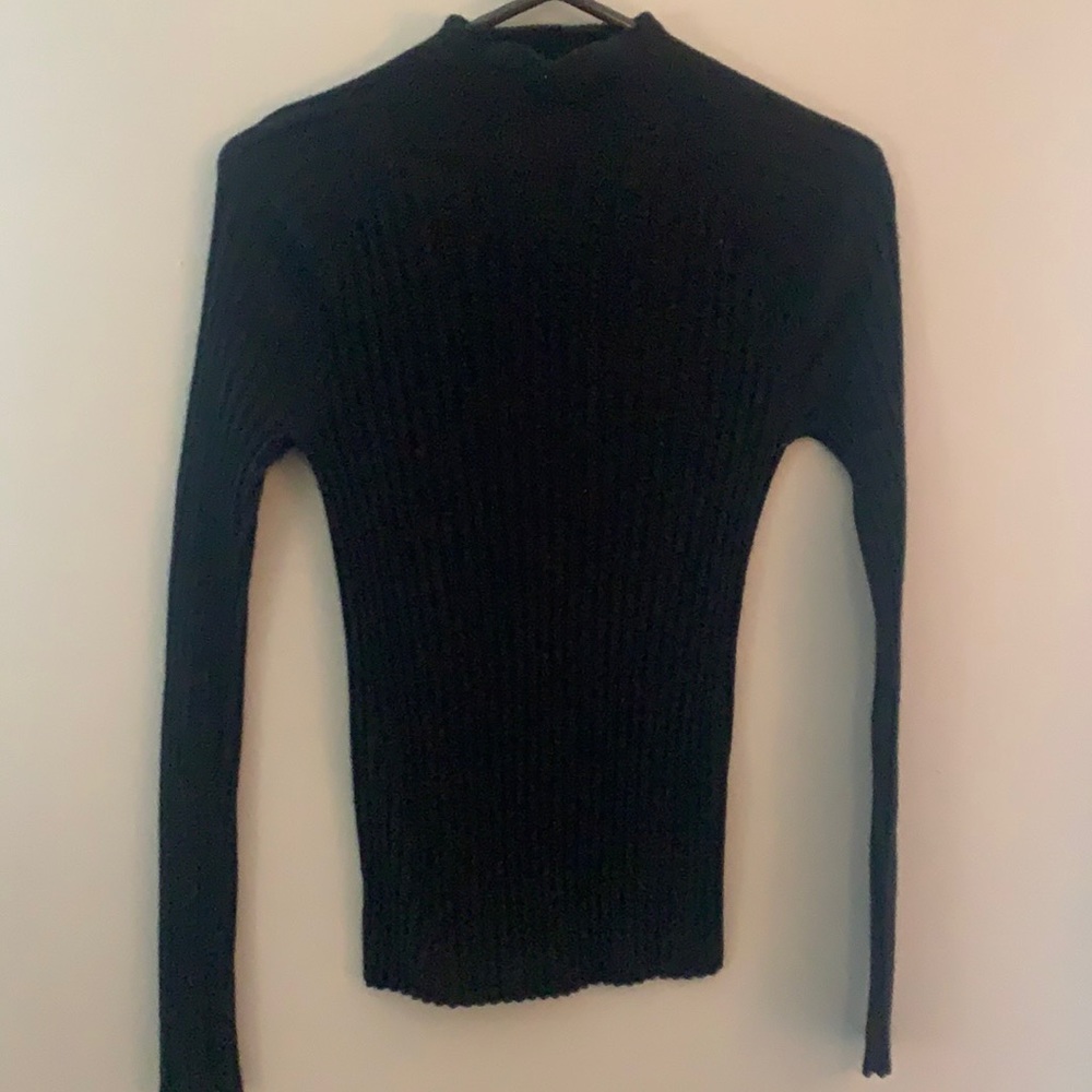 Tight turtleneck sweater, no brand.